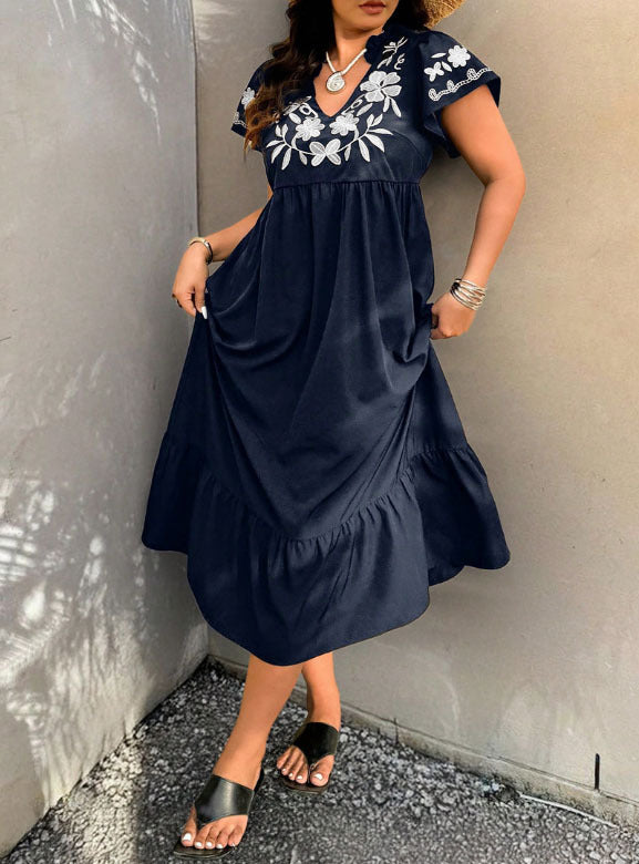 Damernas Maxiklänning med blommönster broderi och voluminös kjol Mirla-Eva Jonsson