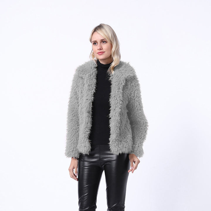 Damernas Mode Konstpälsjacka med elegant krage och sidofickor Mirla-Eva Jonsson