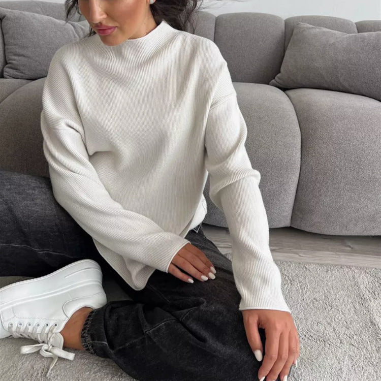 Damernas Modern stickad topp med hög krage och fint ribbmönster Eva Jonsson-Eva Jonsson