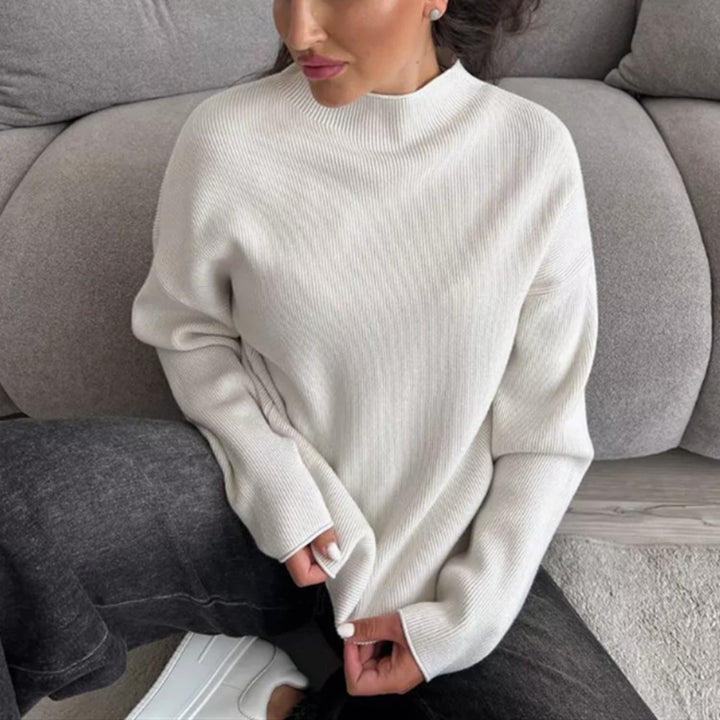 Damernas Modern stickad topp med hög krage och fint ribbmönster Eva Jonsson-Eva Jonsson
