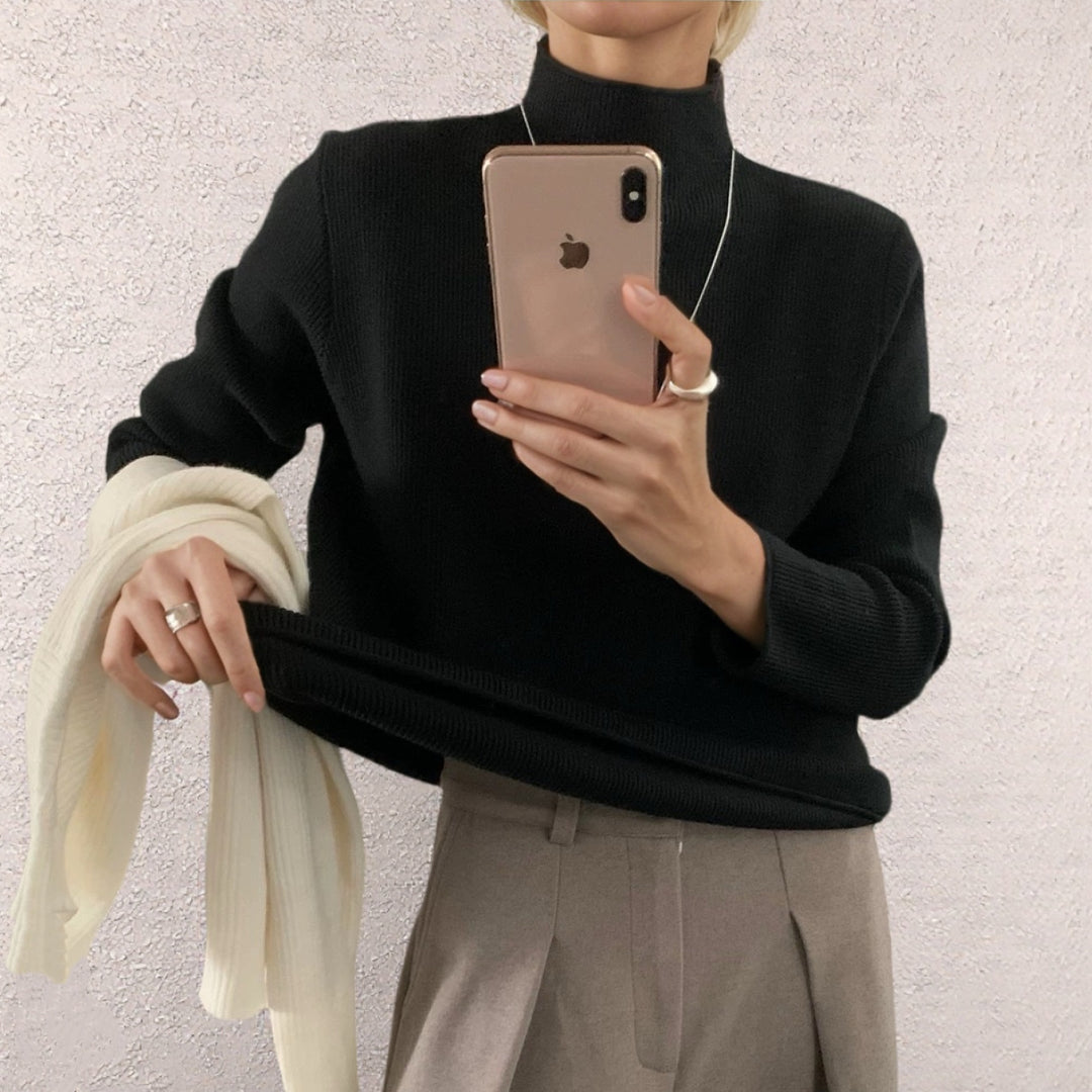 Damernas Modern stickad topp med hög krage och fint ribbmönster Eva Jonsson-Eva Jonsson