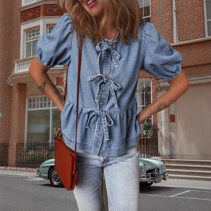 Damernas Modetröja i jeans med dekorativa sladdetaljer och voluminösa ärmar Mirla-Eva Jonsson