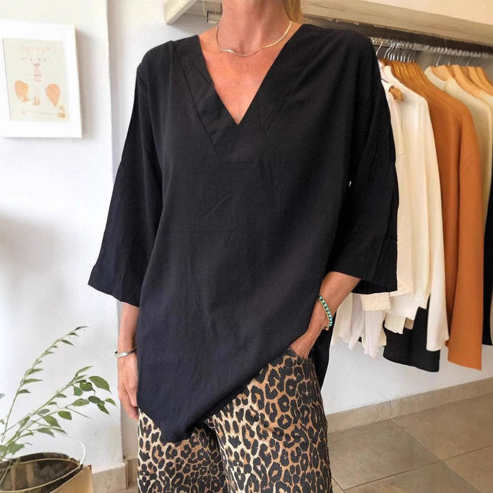 Damernas Oversize Tunika med modern V-hals och avslappnade ärmar Mirla-Eva Jonsson