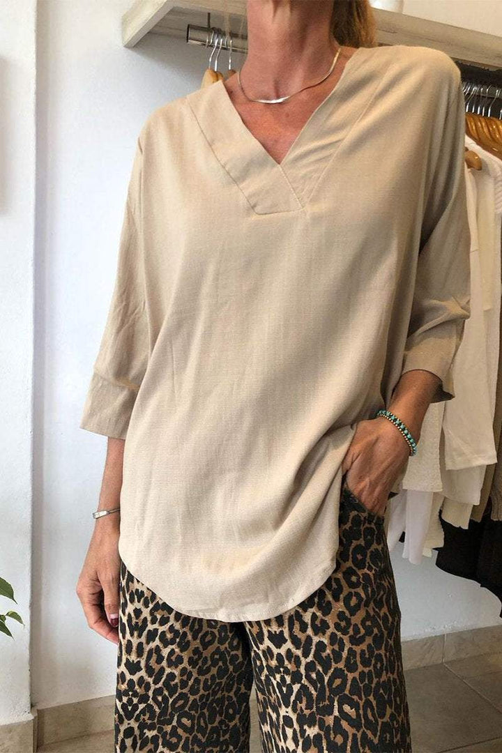 Damernas Oversize Tunika med modern V-hals och avslappnade ärmar Mirla-Eva Jonsson