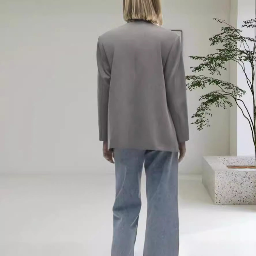 Damernas Oversized Blazer med elegant silhuett och dekorativa knappar Mirla-Eva Jonsson