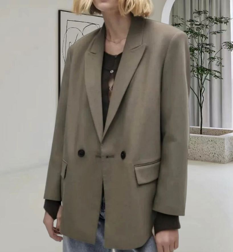 Damernas Oversized Blazer med elegant silhuett och dekorativa knappar Mirla-Eva Jonsson