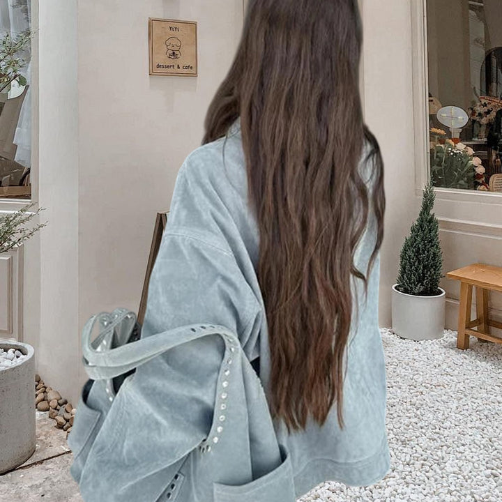 Damernas Oversized Denimjacka i avslappnad stil med praktiska fickor Mirla-Eva Jonsson