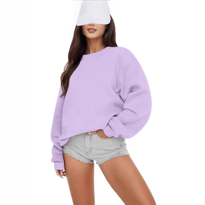 Damernas Oversized Sweatshirt med avslappnad passform och mjuka ärmar Mirla-Eva Jonsson