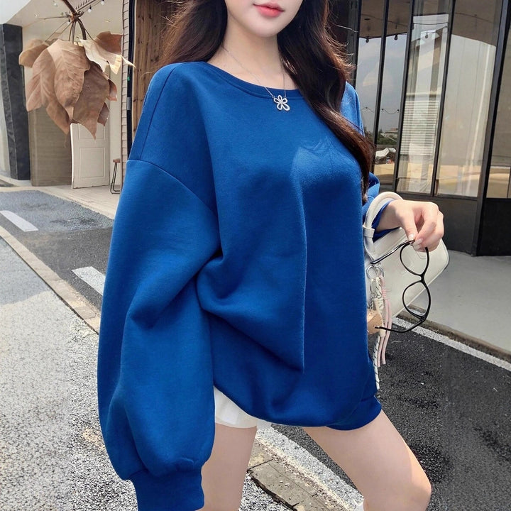 Damernas Oversized Sweatshirt med strukturerade ärmar och mjukt foder Mirla-Eva Jonsson
