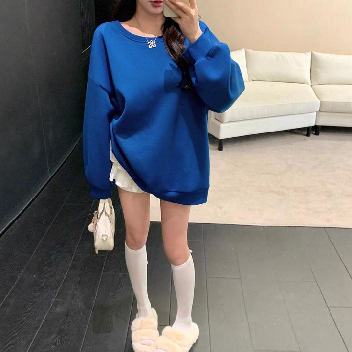 Damernas Oversized Sweatshirt med strukturerade ärmar och mjukt foder Mirla-Eva Jonsson