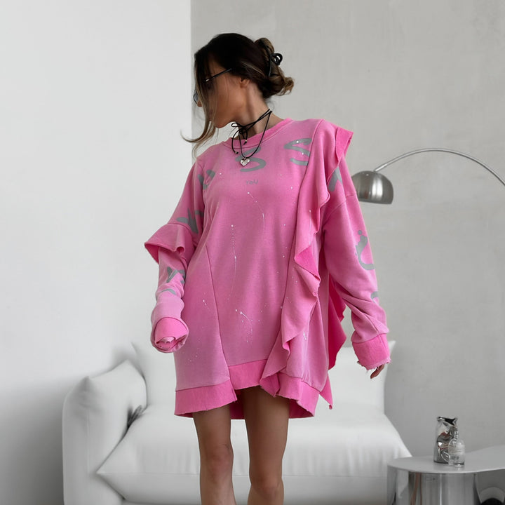 Damernas Oversized Sweatshirt med volanger och iögonfallande tryck Mirla-Eva Jonsson