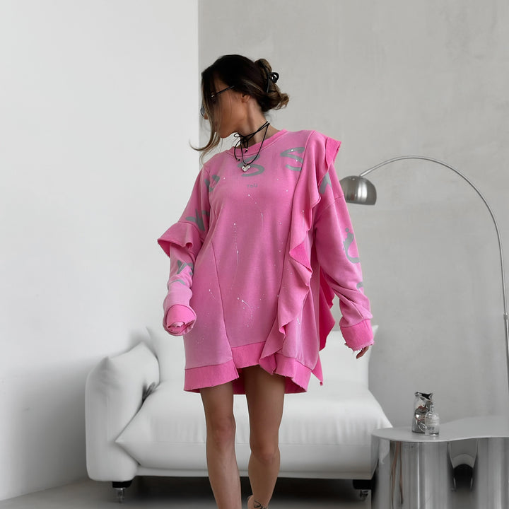 Damernas Oversized Sweatshirt med volanger och iögonfallande tryck Mirla-Eva Jonsson