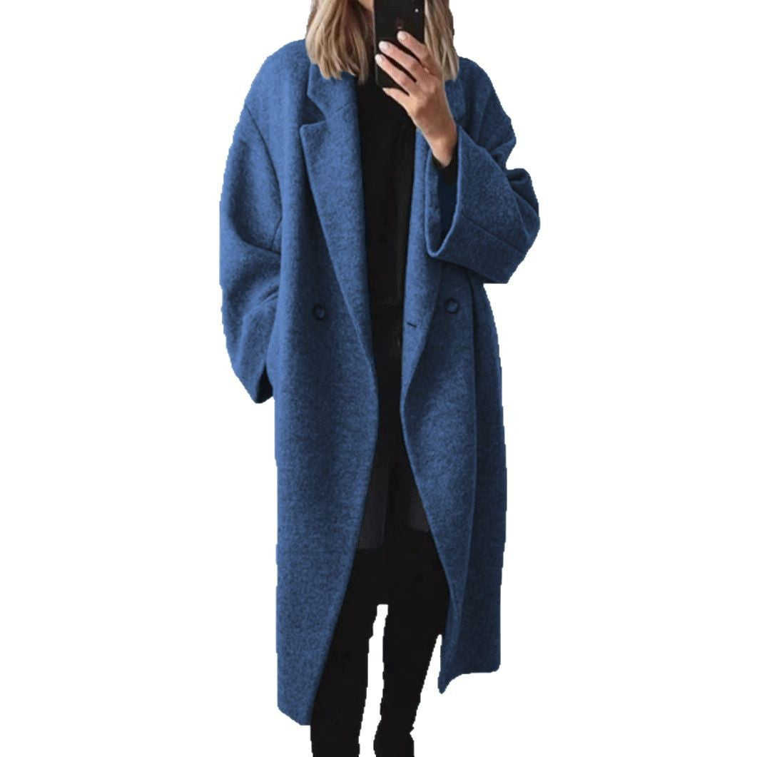 Damernas Oversized Ullkappa med elegant snitt och praktiska fickor Mirla-Eva Jonsson