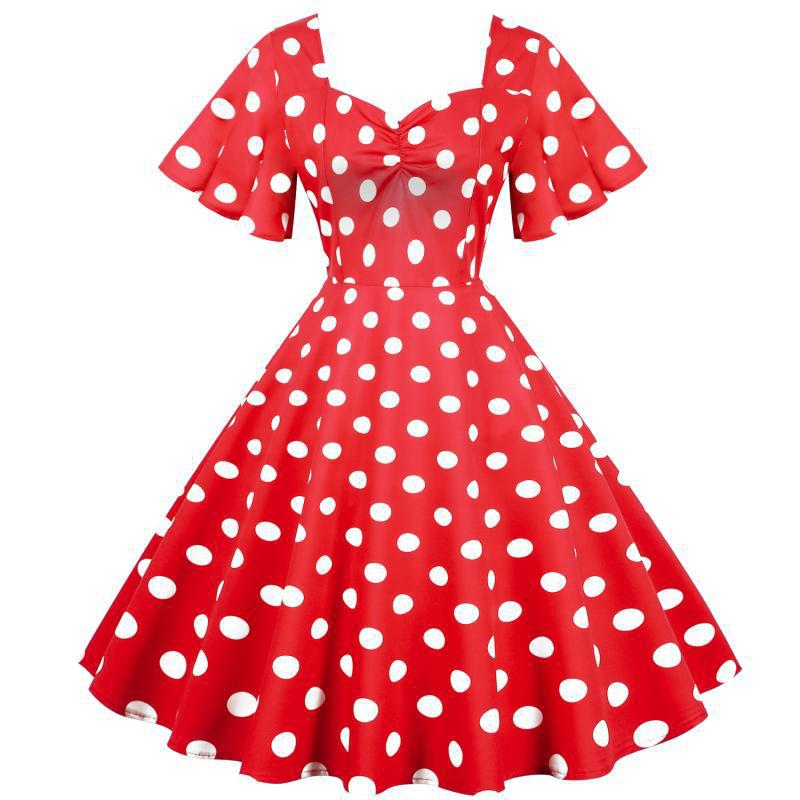 Damernas Rockabilly-klänning med lekfullt prickigt mönster och svängande fåll Mirla-Eva Jonsson