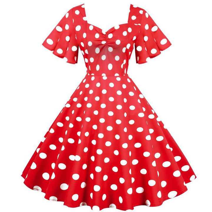 Damernas Rockabilly-klänning med lekfullt prickigt mönster och svängande fåll Mirla-Eva Jonsson