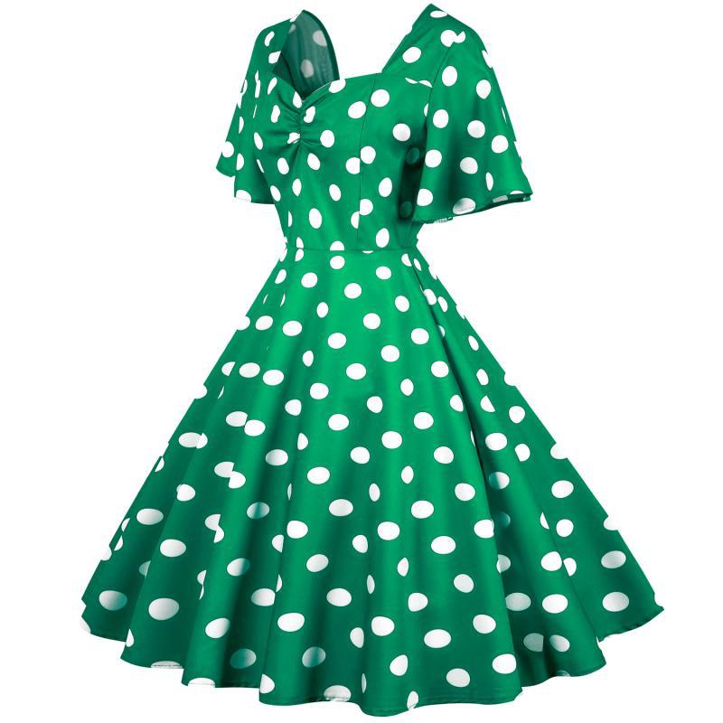 Damernas Rockabilly-klänning med lekfullt prickigt mönster och svängande fåll Mirla-Eva Jonsson