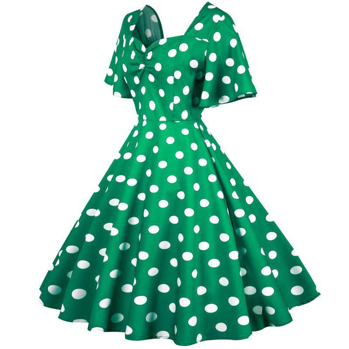Damernas Rockabilly-klänning med lekfullt prickigt mönster och svängande fåll Mirla-Eva Jonsson