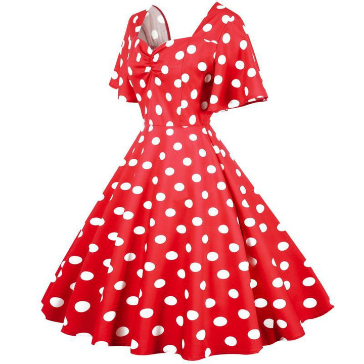 Damernas Rockabilly-klänning med lekfullt prickigt mönster och svängande fåll Mirla-Eva Jonsson
