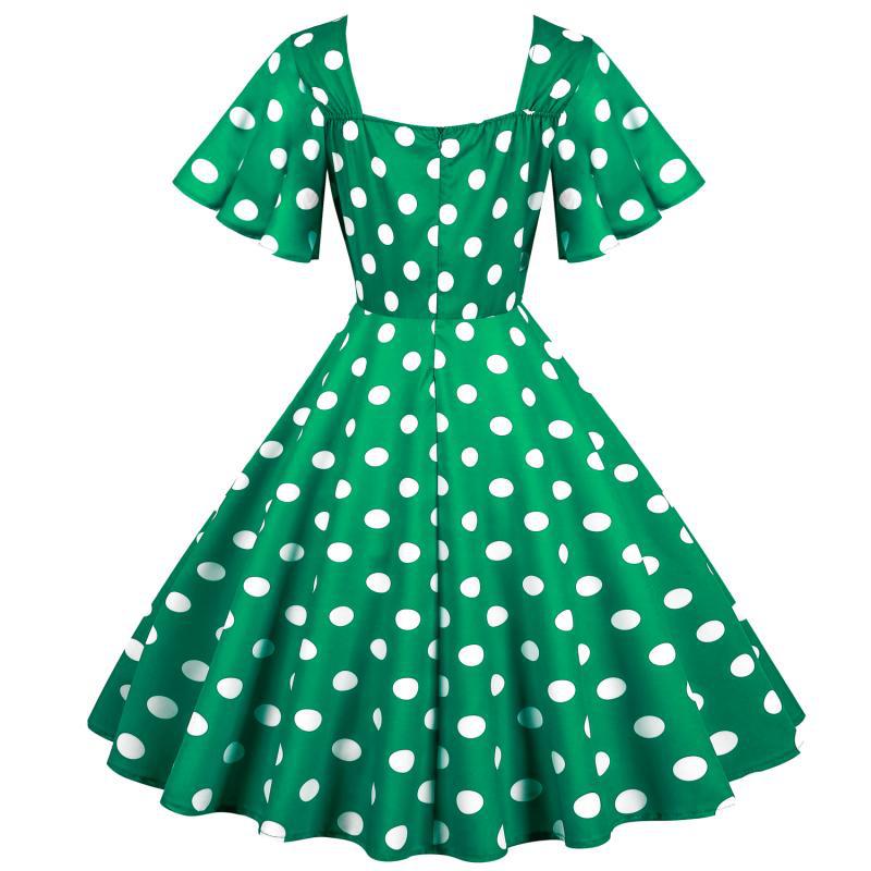 Damernas Rockabilly-klänning med lekfullt prickigt mönster och svängande fåll Mirla-Eva Jonsson