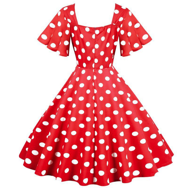 Damernas Rockabilly-klänning med lekfullt prickigt mönster och svängande fåll Mirla-Eva Jonsson