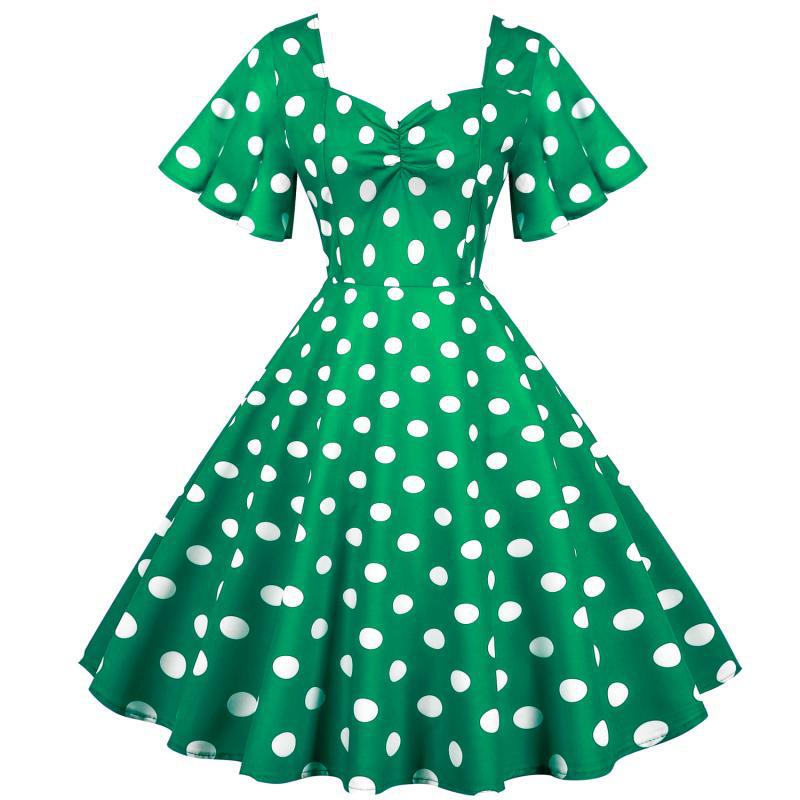 Damernas Rockabilly-klänning med lekfullt prickigt mönster och svängande fåll Mirla-Eva Jonsson