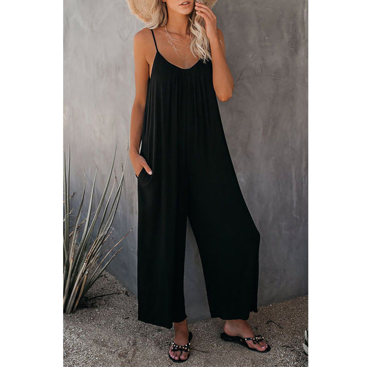 Damernas Snygga Jumpsuit med Bred Passform och Praktiska Fickor Mirla-Eva Jonsson