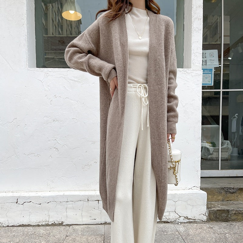 Damernas Stor Stickad Cardigan med Öppet Design och Voluminösa Ärmar Mirla-Eva Jonsson