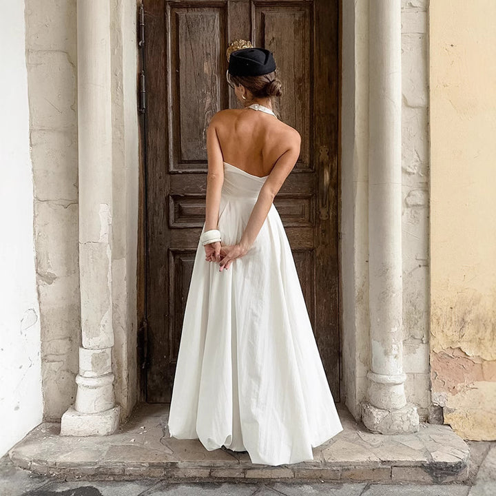 Damernas Strapless Mai dress med elegant hög slits och flytande kjol Mirla-Eva Jonsson