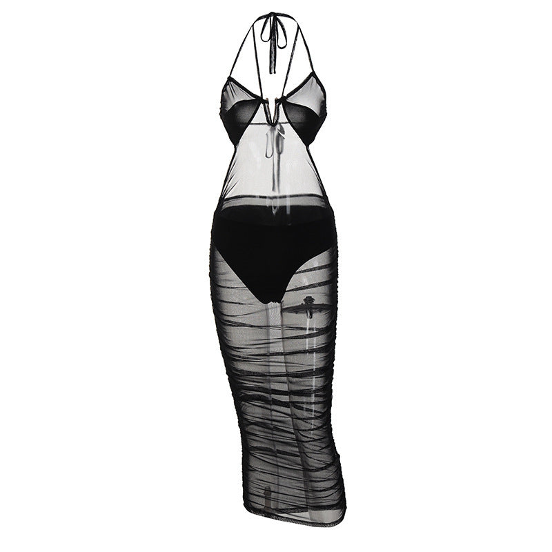 Damernas Transparent Bodycon Maxiklänning med djup u-ringning och lekfulla band Mirla-Eva Jonsson