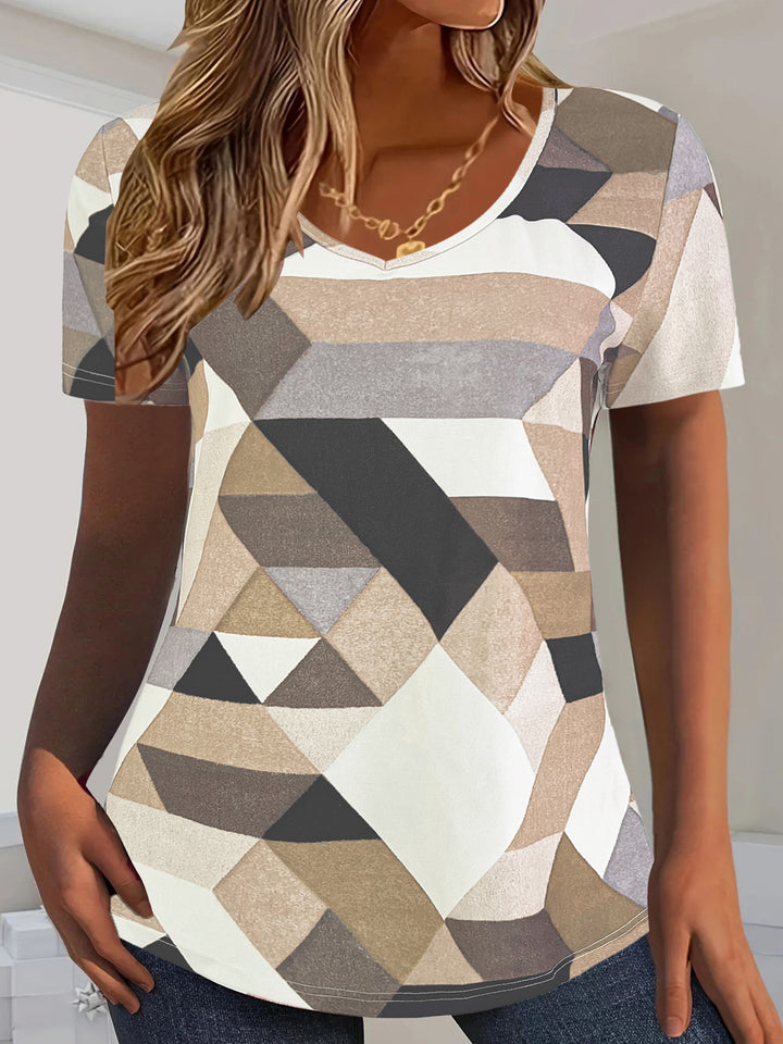Damernas V-hals T-shirt med geometriskt mönster och mjukt material Mirla-Eva Jonsson