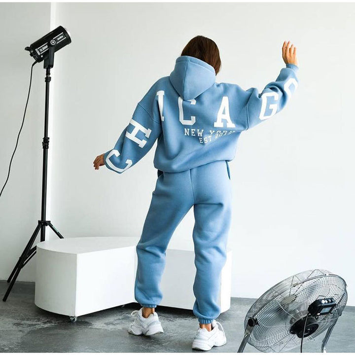 Damernas avslappnad oversize-svettdress med huva och elastisk midja Mirla-Eva Jonsson