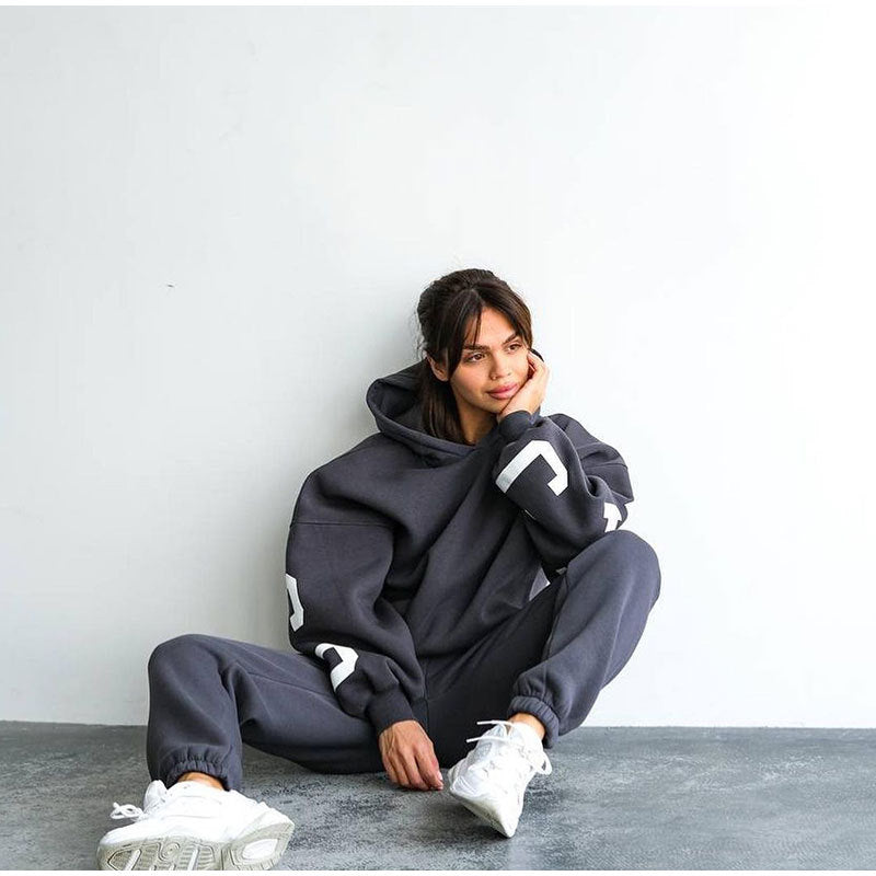 Damernas avslappnad oversize-svettdress med huva och elastisk midja Mirla-Eva Jonsson