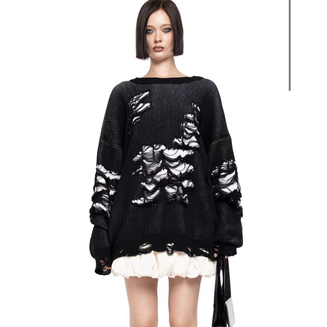 Damernas avslappnad oversized tröja med unika destroyed-detaljer Mirla-Eva Jonsson