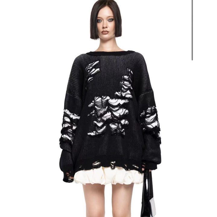 Damernas avslappnad oversized tröja med unika destroyed-detaljer Mirla-Eva Jonsson
