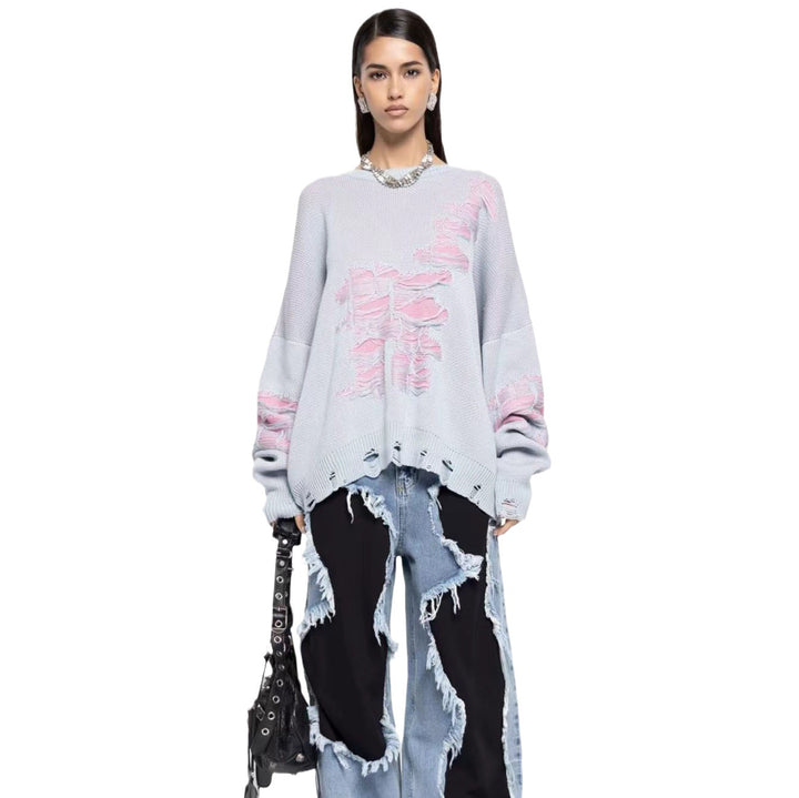Damernas avslappnad oversized tröja med unika destroyed-detaljer Mirla-Eva Jonsson
