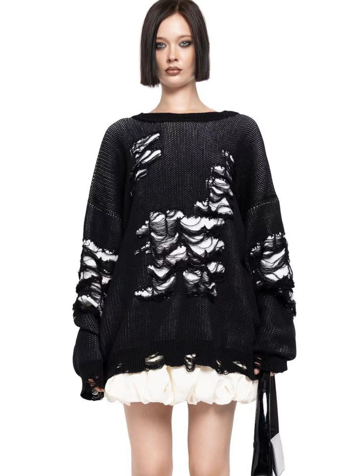 Damernas avslappnad oversized tröja med unika destroyed-detaljer Mirla-Eva Jonsson