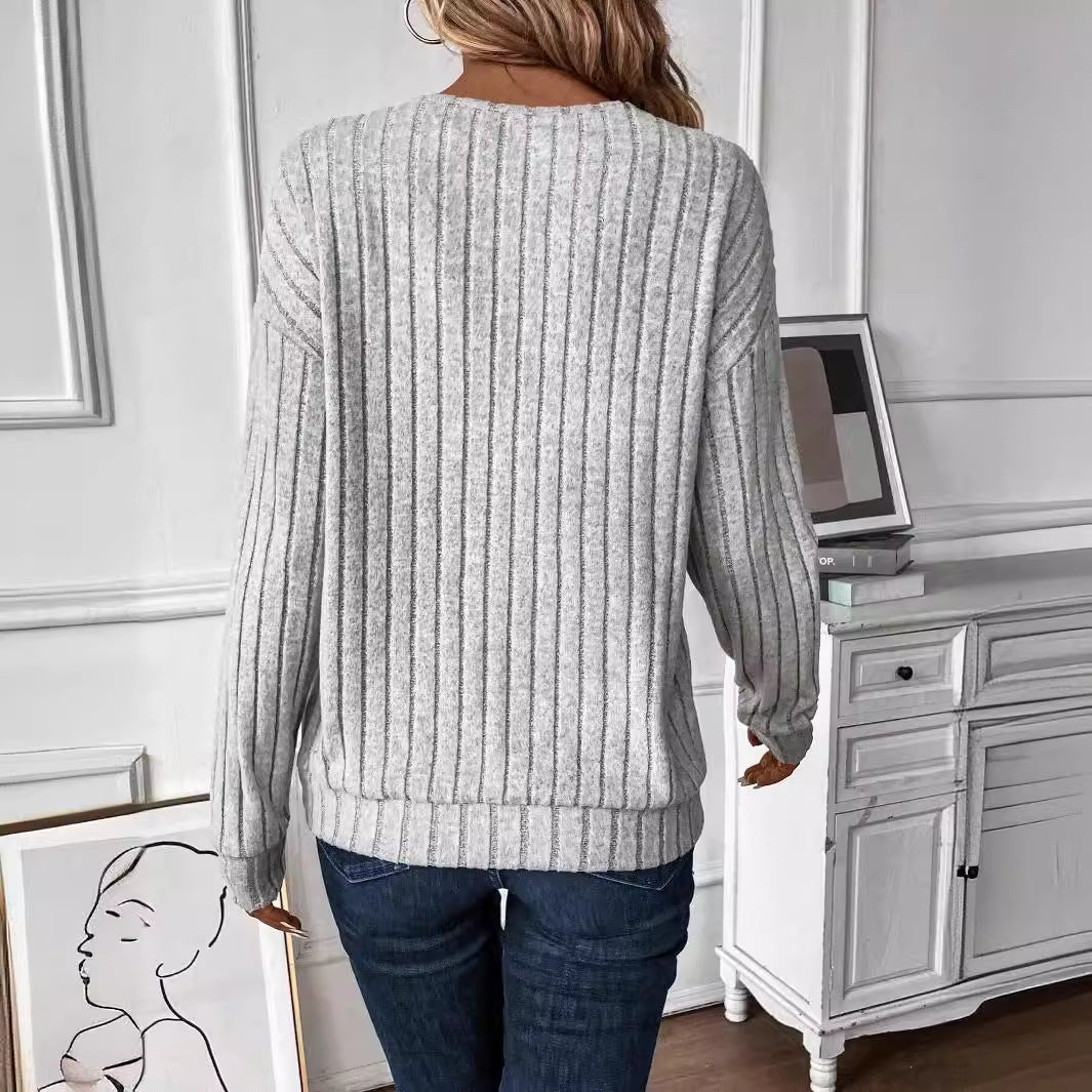 Damernas avslappnade V-halsad tröja med ribbad struktur Mirla-Eva Jonsson