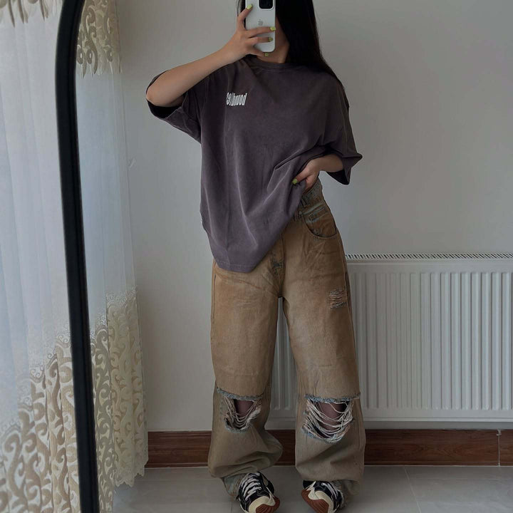 Damernas avslappnade baggy-jeans med fransade insnitt Mirla-Eva Jonsson