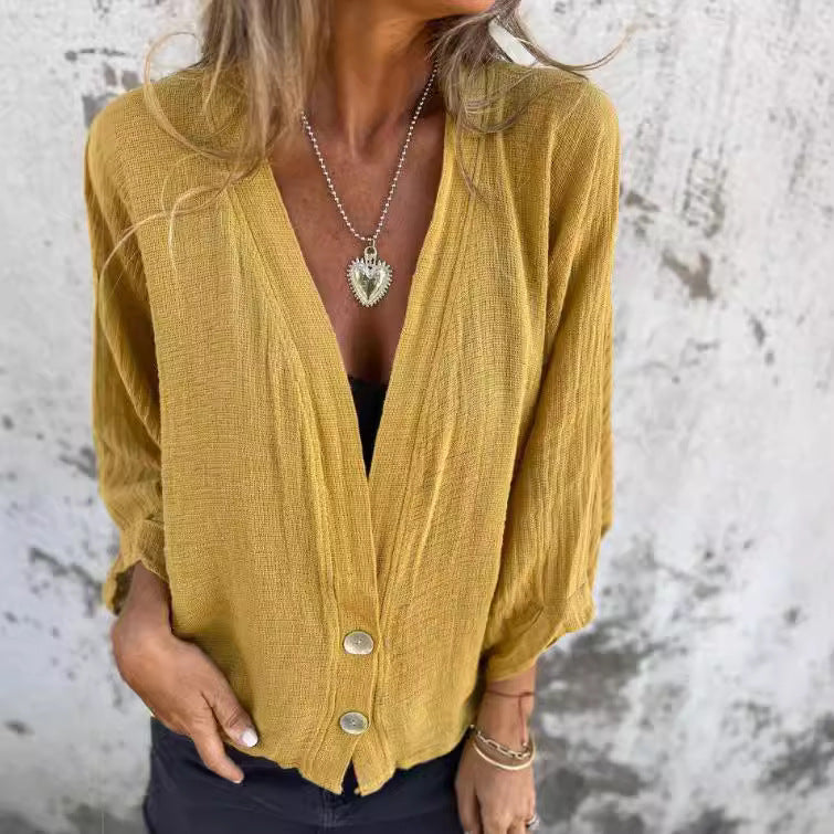 Damernas avslappnade cardigan med eleganta knappdetaljer Mirla-Eva Jonsson