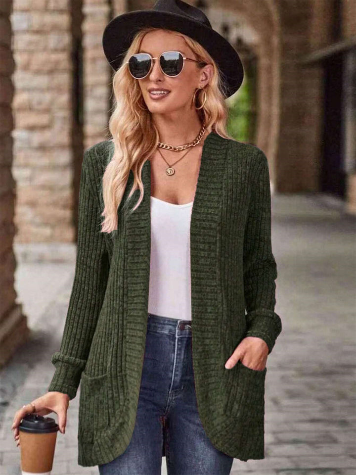 Damernas avslappnade cardigan med strukturerad design och praktiska fickor Mirla-Eva Jonsson