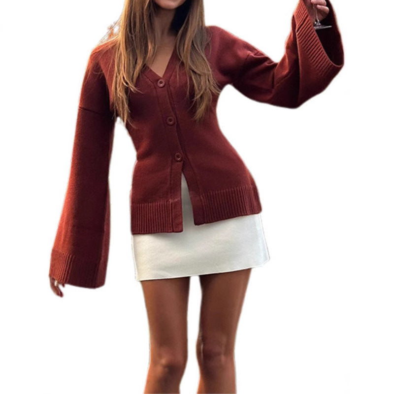 Damernas avslappnade cardigan med vida ärmar och knapprad detaljer Mirla-Eva Jonsson