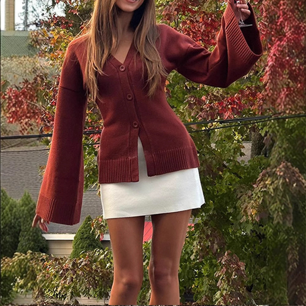 Damernas avslappnade cardigan med vida ärmar och knapprad detaljer Mirla-Eva Jonsson