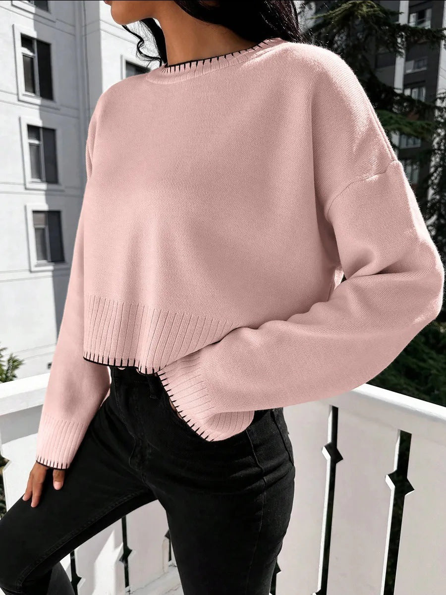 Damernas avslappnade crop-pullover med strukturerade fållar och rundhals. Eva Jonsson-Eva Jonsson
