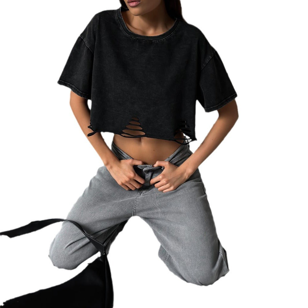 Damernas avslappnade cropped T-shirt med unik skärning och öppna detaljer Mirla-Eva Jonsson