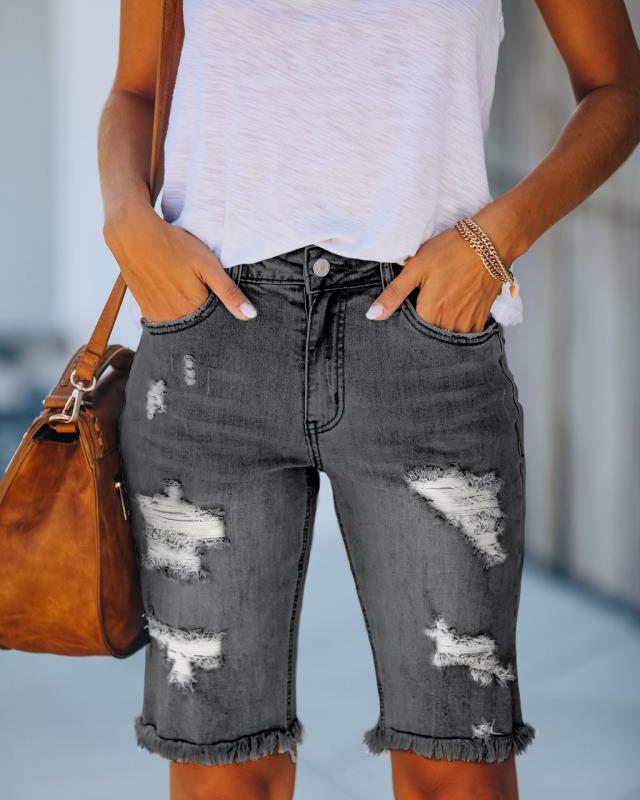 Damernas avslappnade denimshorts med fransad kant och iögonfallande used-look Mirla-Eva Jonsson