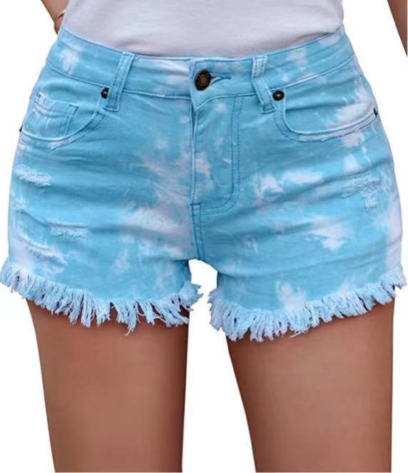 Damernas avslappnade denimshorts med unikt batikmönster och fransig fåll Mirla-Eva Jonsson