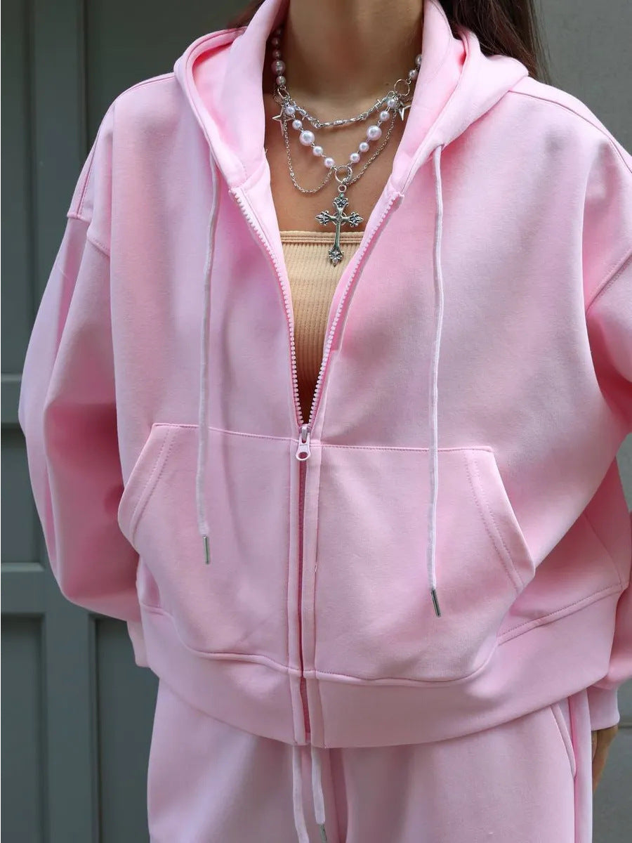 Damernas avslappnade hoodie-joggingdräkt med elastisk midja och praktiska fickor Mirla-Eva Jonsson