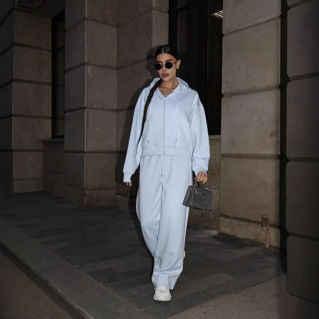 Damernas avslappnade hoodie-joggingdräkt med elastisk midja och praktiska fickor Mirla-Eva Jonsson
