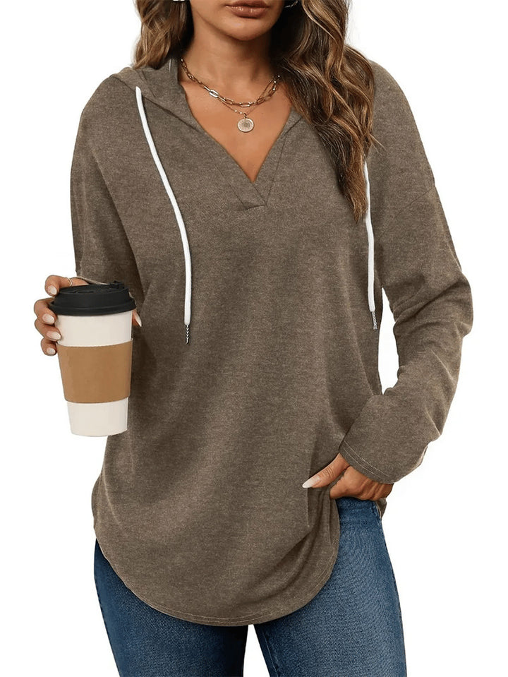 Damernas avslappnade hoodie med V-hals och sidofickor Mirla-Eva Jonsson