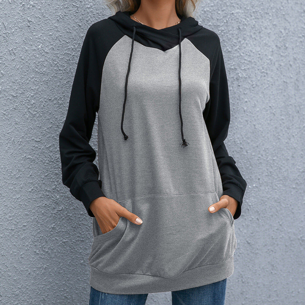 Damernas avslappnade hoodie med fickor och sportig raglanpassform Eva Jonsson-Eva Jonsson